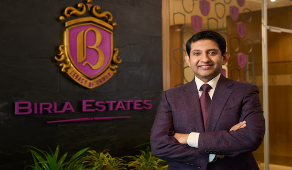 Professional portraits of Birla Estates' executive management and directors.
